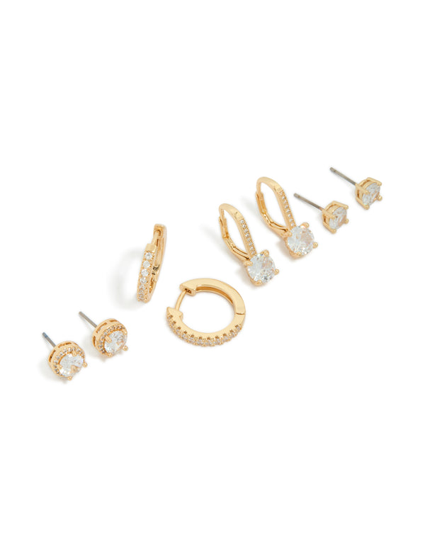 Featuring gold plated cubic zirconia mixed stud and huggie earrings in a 4-pack with crystal accents and huggie closures front view
