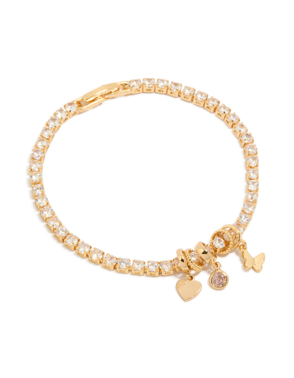 Showcasing a gold plated cubic zirconia mixed charm tennis bracelet with butterfly and heart accents front view