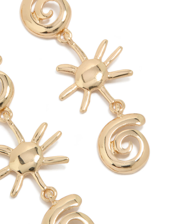 Crafted with statement gold shell and sun drop earrings featuring celestial charm and ocean-inspired design post detail view