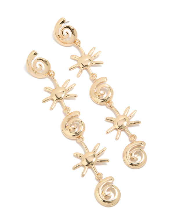 Featuring statement gold shell and sun drop earrings with celestial and ocean-inspired design front view