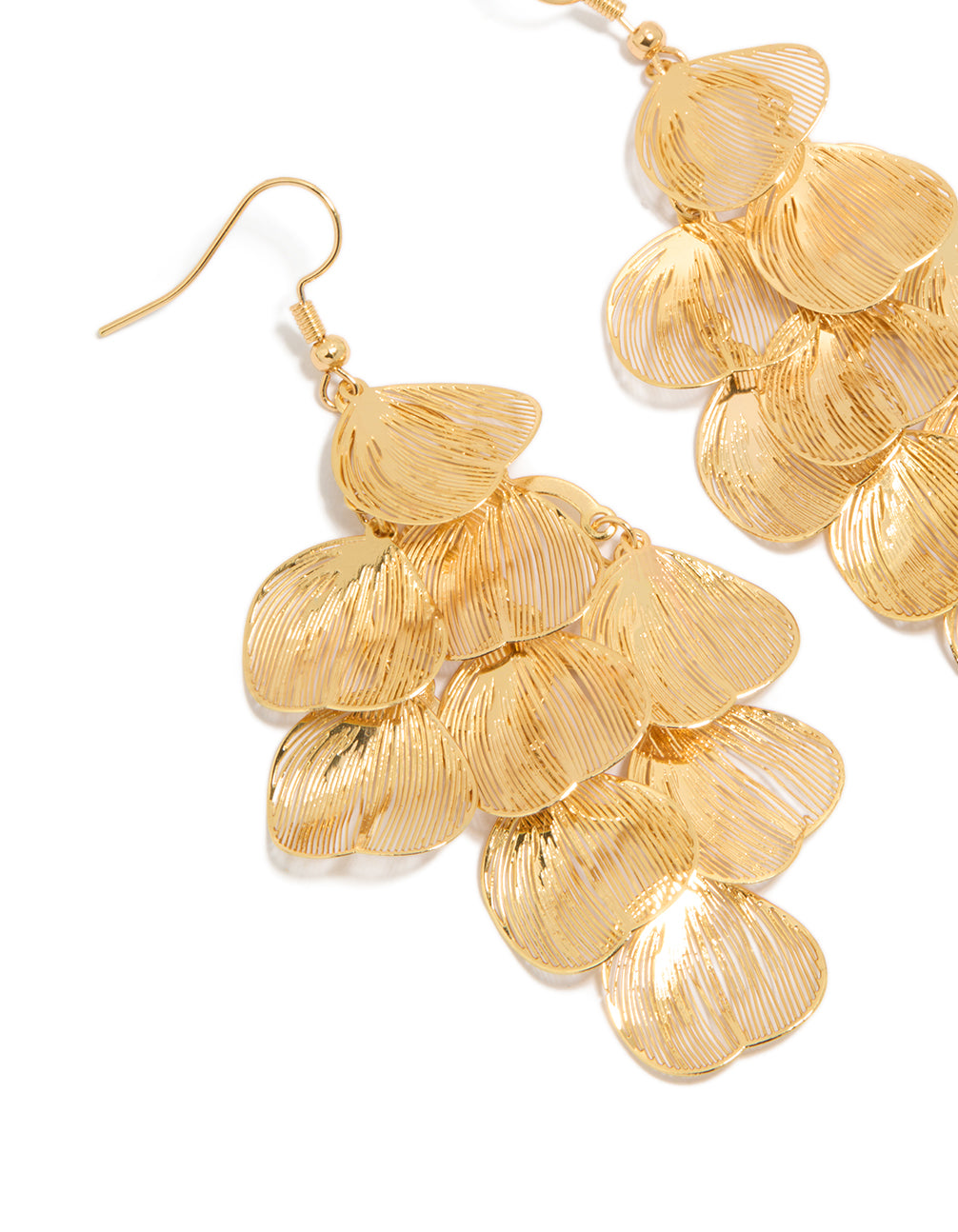 Crafted with statement drop earrings featuring laser cut petal layering with floral leaf details in gold close up view