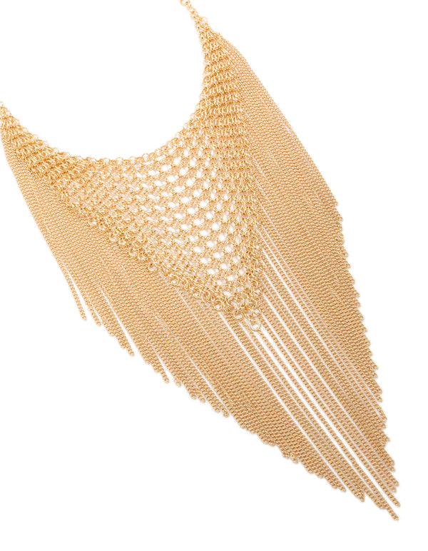Showcasing a gold mesh bib tassel necklace with statement design close up view