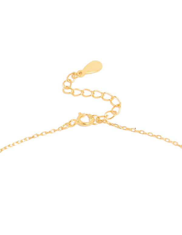 Designed with a cross pendant necklace featuring cubic zirconia, sterling silver, and gold plated material clasp detail view