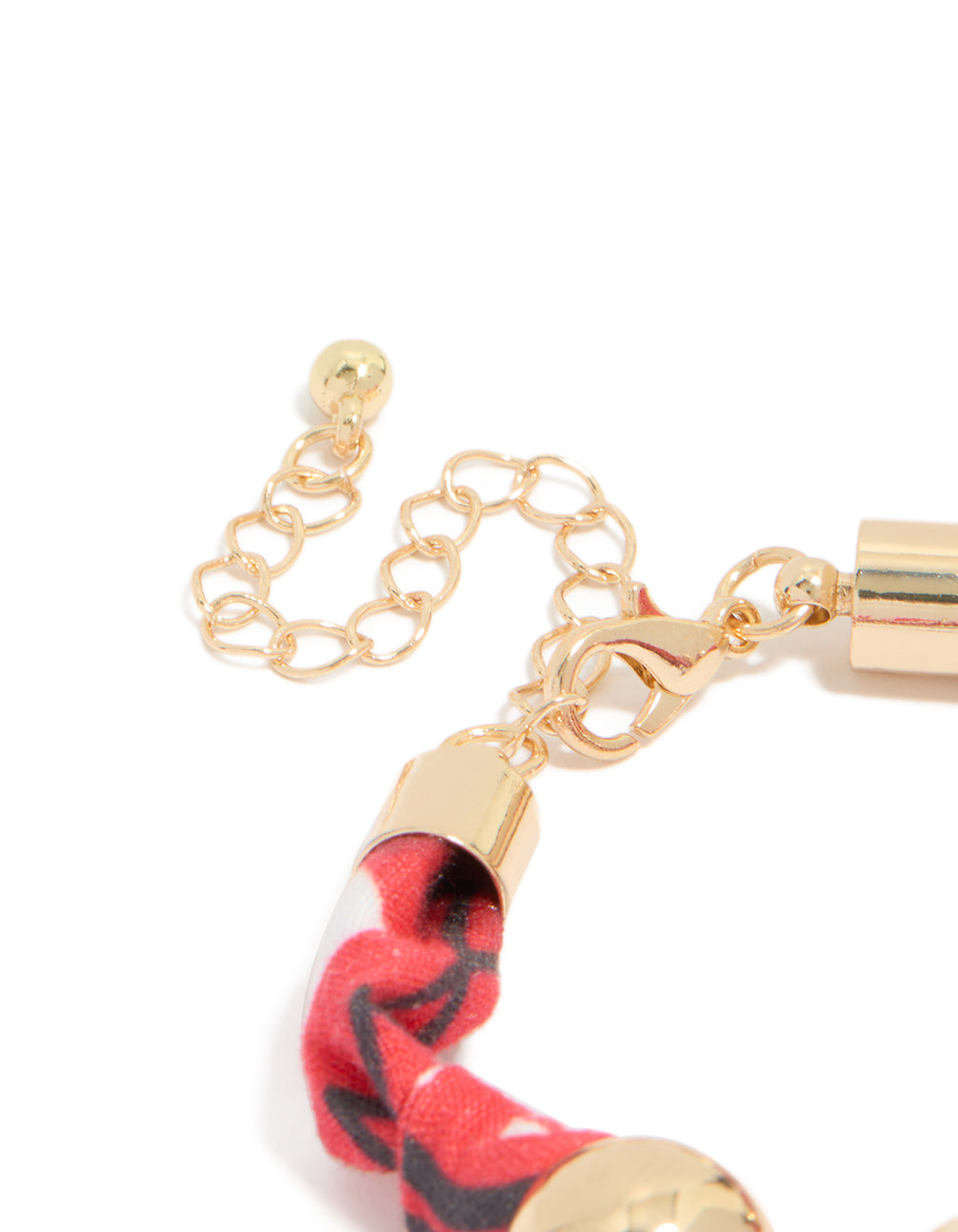 Designed with beads accents in gold and red, this wrapped bracelet with stones closure detail view