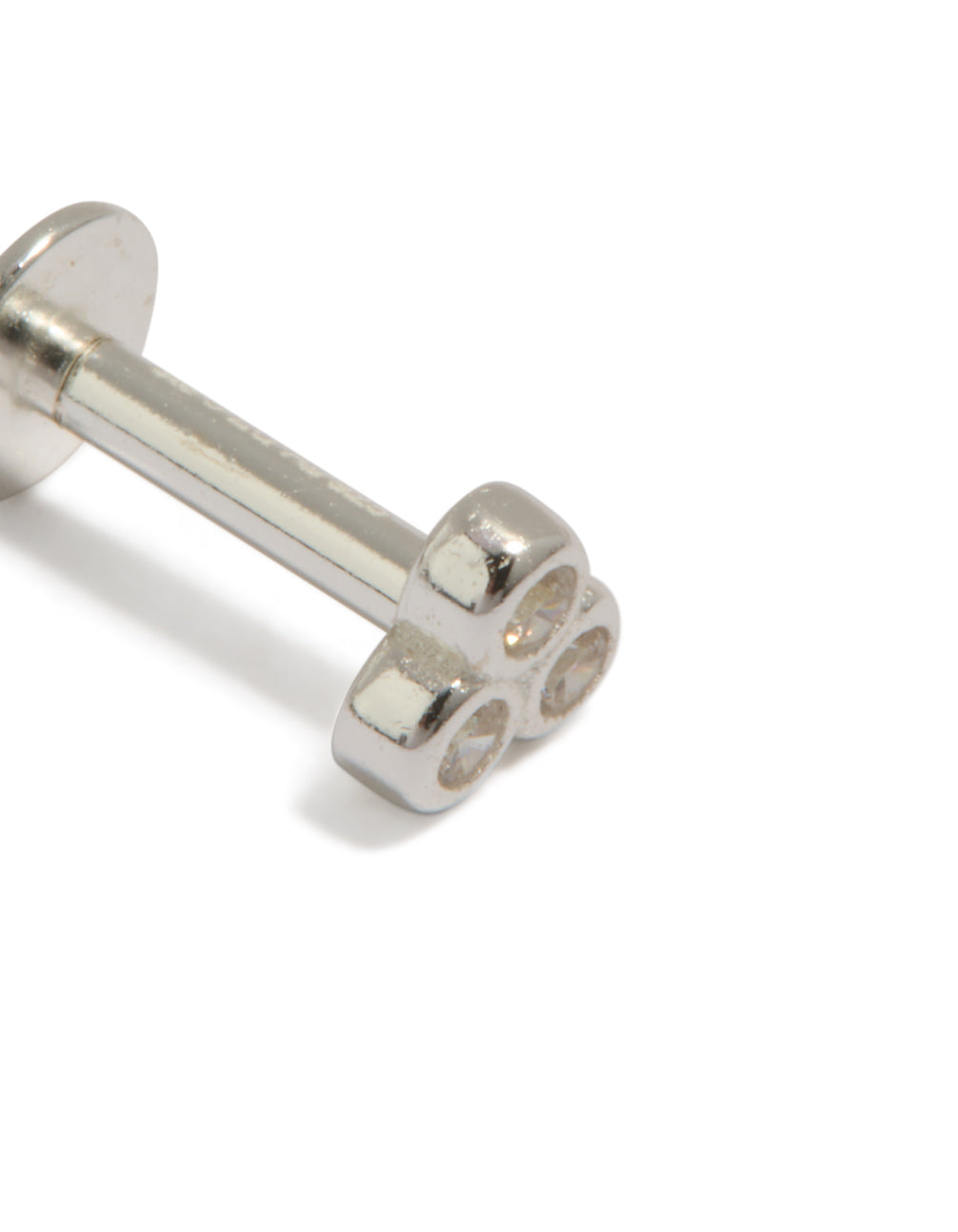 Crafted from sterling silver, this triple cubic zirconia stud features a flat back closure with dainty styling in silver detail view