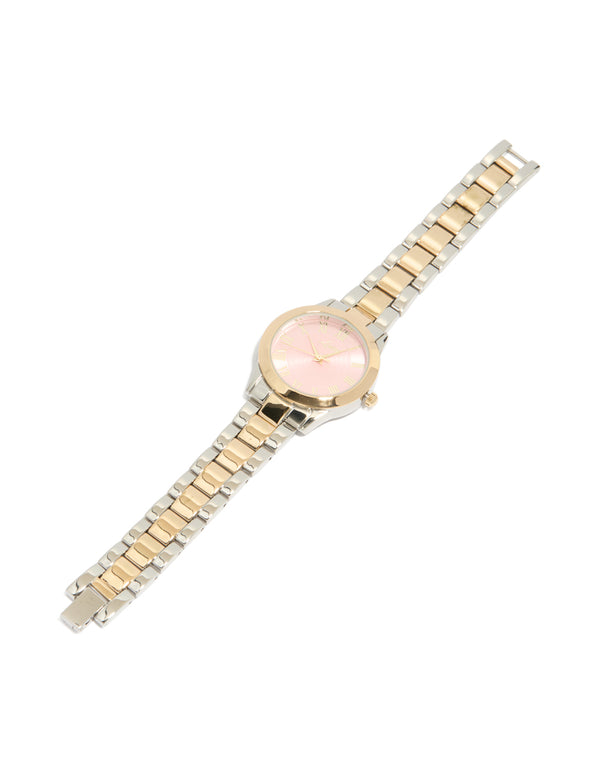 Elegant mixed metal pink face roman numeral watch with numbers on a round dial, crafted for women in casual occasions, featuring a multi-color link band and analog type front view