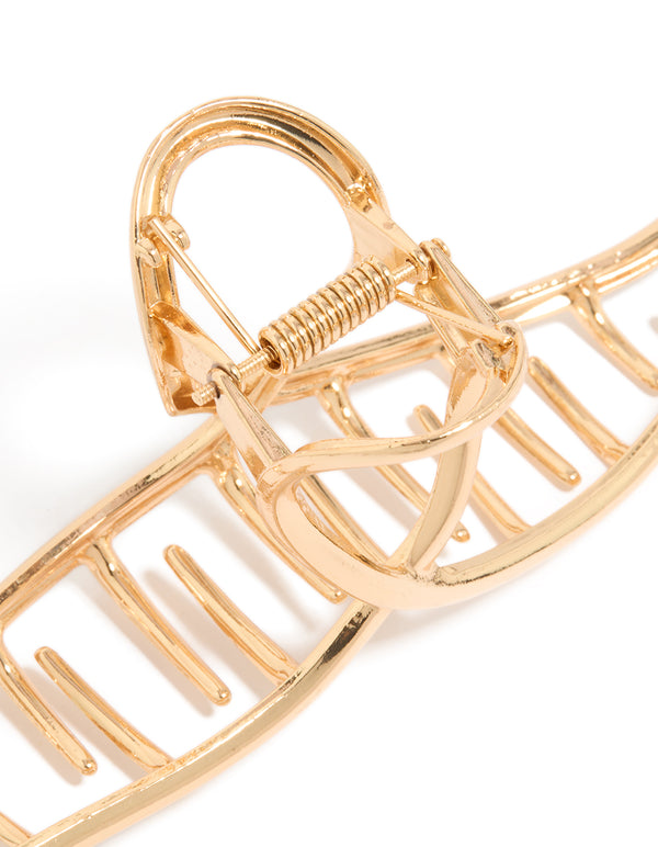 Crafted with a gold wavy claw clip detail view