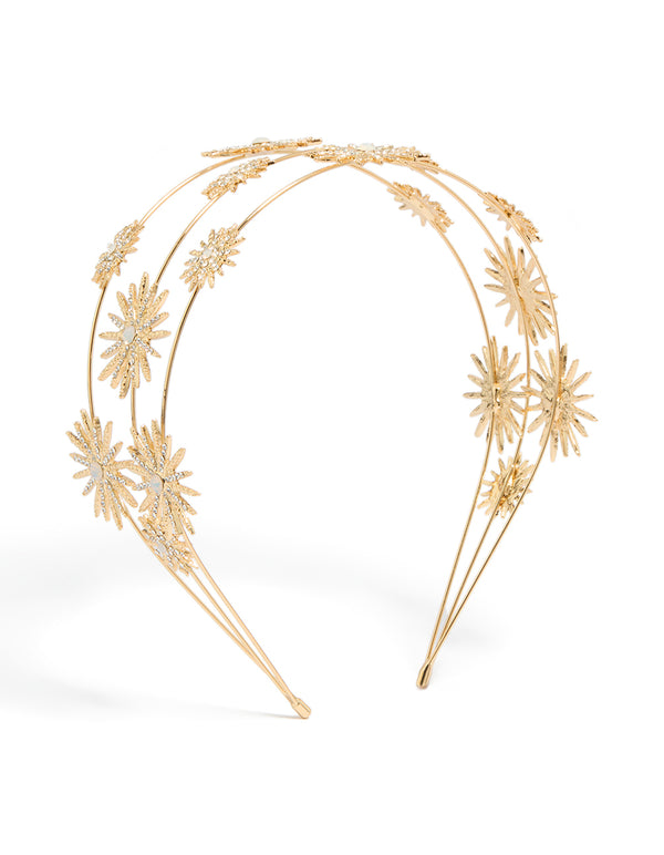 Showcasing a gold diamante triple layered celestial headband with star accents design front view
