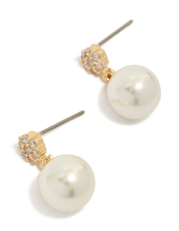Showcasing gold plated small round cubic zirconia and pearl drop earrings in white front view
