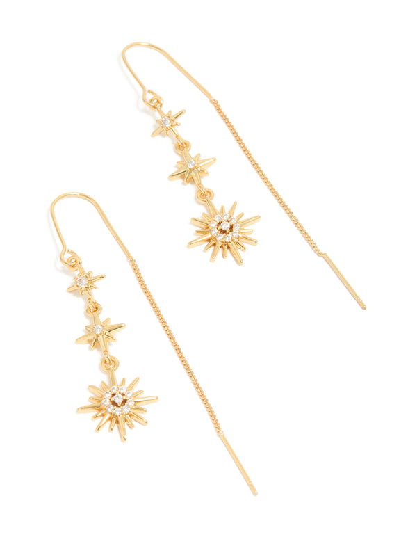 Showcasing gold plated cubic zirconia stars thread through earrings with celestial charm front view