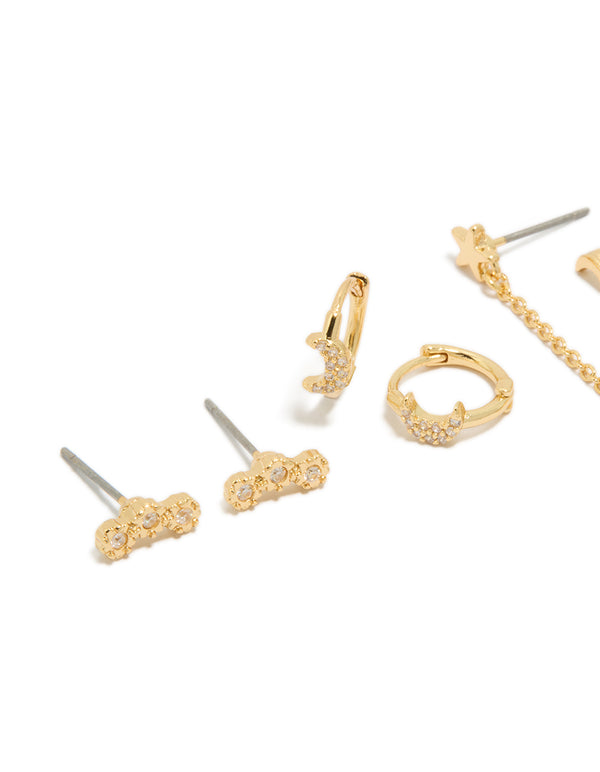 Detailed look at gold plated celestial moon earrings featuring cubic zirconia with star details close up view