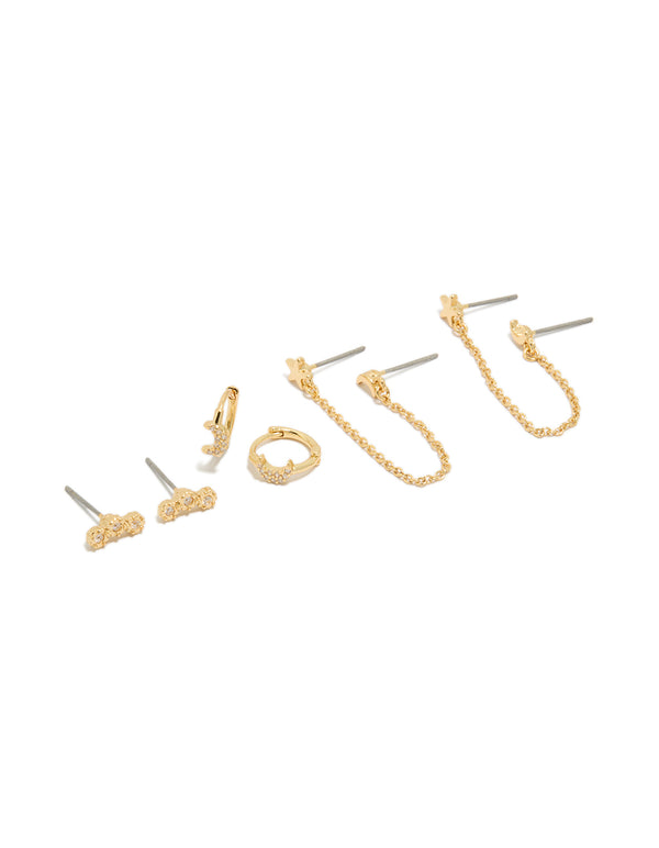 Showcasing celestial earrings with moon and star designs, crafted from cubic zirconia in a 4-pack featuring huggie and stud closures front view