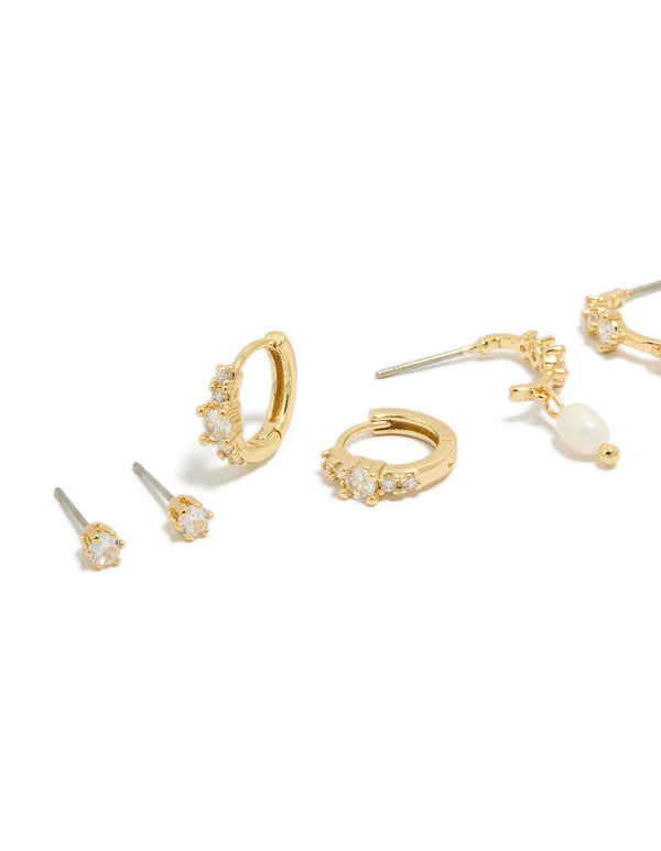 Crafted from gold plated materials, cubic zirconia and freshwater pearl drop hoop earrings 4-pack with hoop closure in white ivory close up view