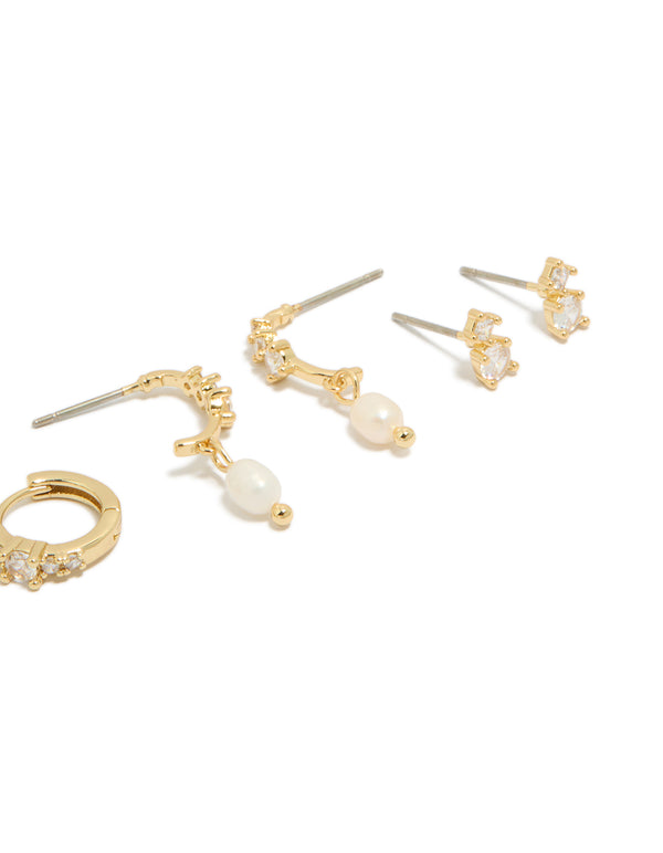Designed with gold plated cubic zirconia and freshwater pearl drop hoop earrings 4-pack with hoop closure in white ivory post detail view