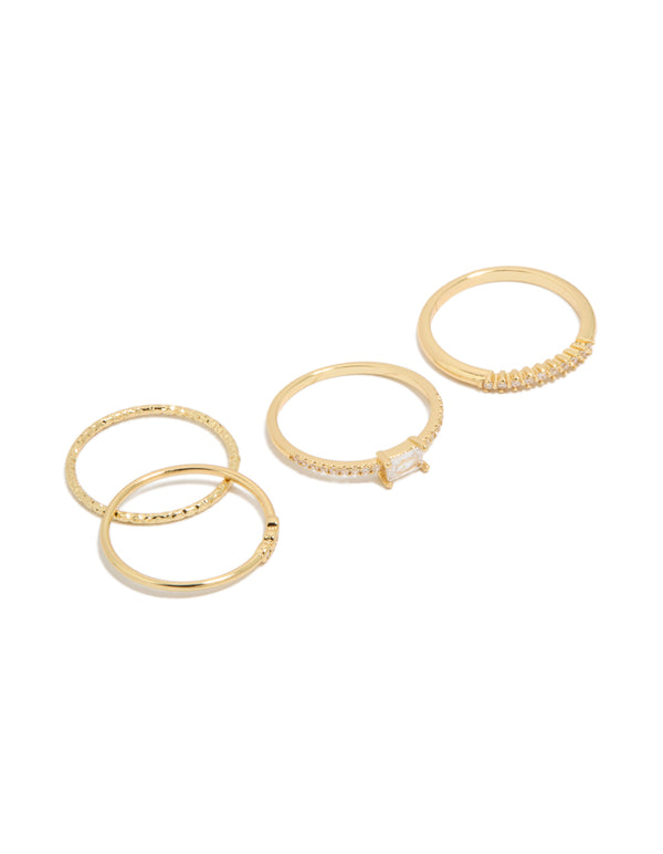 Showcasing gold plated cubic zirconia square bezel and fine band rings 4-pack in stackable statement style front view