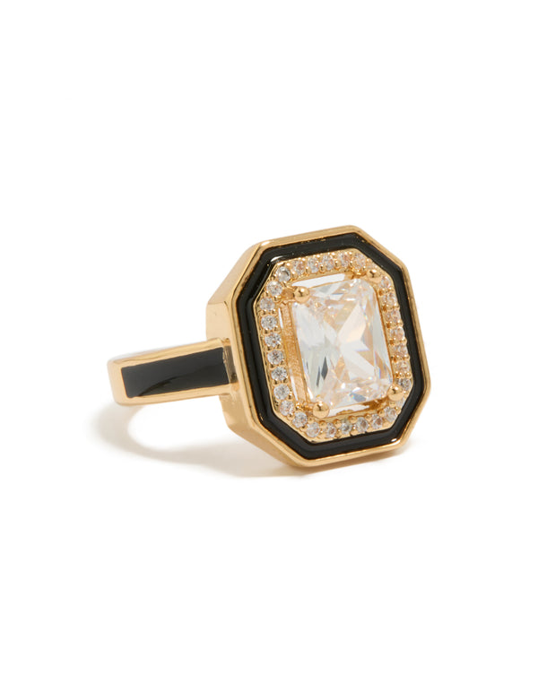 Showcasing a statement ring with cushion cut cubic zirconia, black enamel outline, crafted from gold plated crystal front view