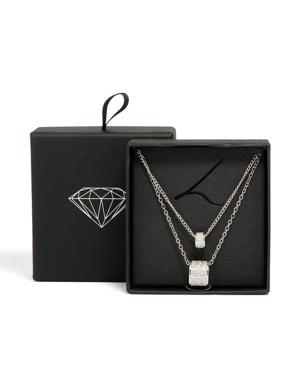 Showcasing a necklace crafted from cubic zirconia with layered rondelle design in silver close up view