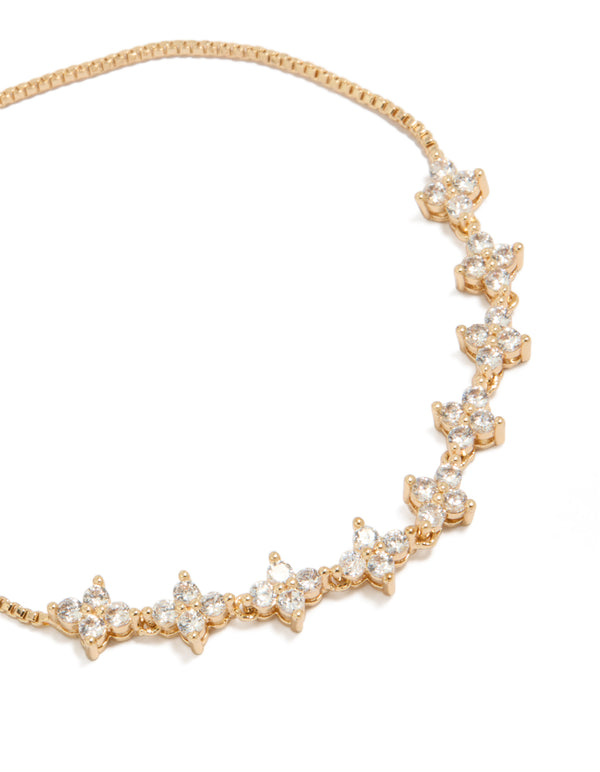 Featuring a floral cubic zirconia bracelet in gold with a statement style close up view