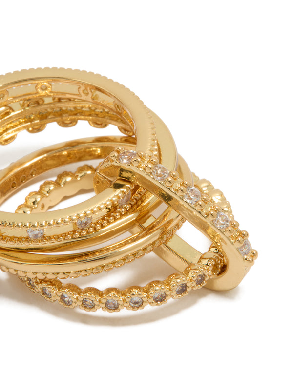 Showcasing a gold plated cubic zirconia interlinked stacked ring with statement crystal detailing close up view
