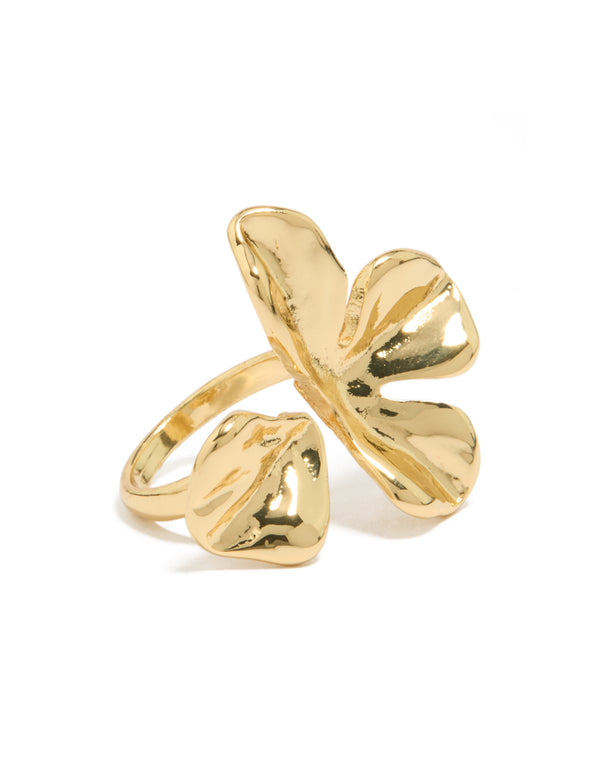 Showcasing a statement gold plated molten floral wrap ring with dimensional petal design front view
