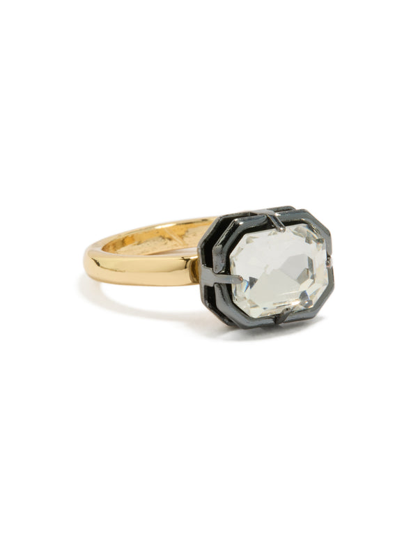Showcasing a gold plated cubic zirconia mixed metal statement ring with crystal and silver design side detail view