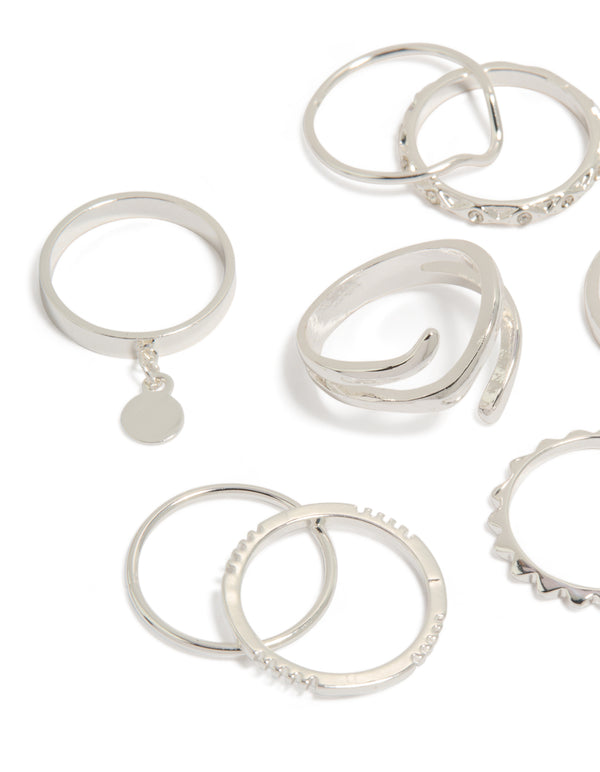 Crafted from silver, this mixed swirl stacking rings 8-pack with charm and disc details close up view