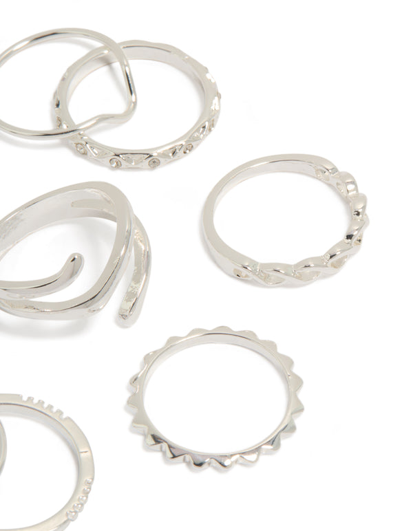Featuring charm and disc accents, silver mixed swirl stacking rings 8-pack side detail view