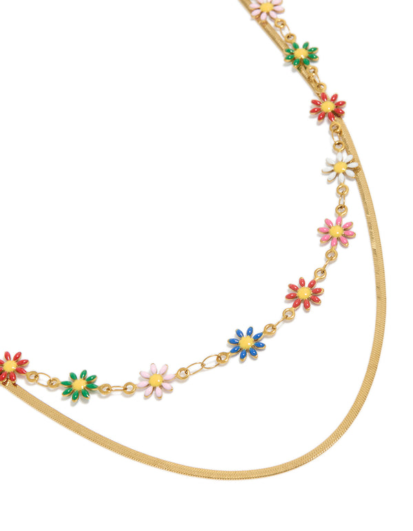 Close-up showcasing a waterproof gold plated stainless steel snake chain with colourful daisies layered necklace featuring floral charm details close up view