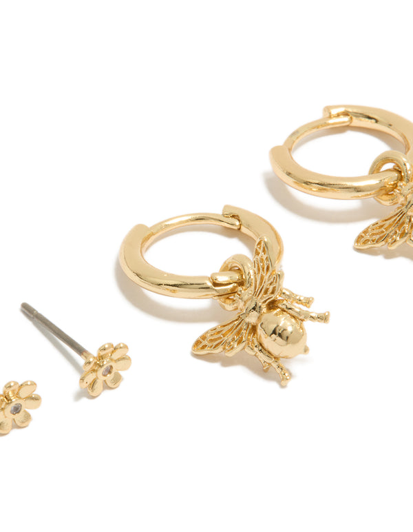 Featuring gold plated micro flower studs and bumblebee huggie earrings 2-pack huggie closures close up view