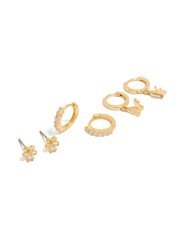 Discover dainty gold plated cubic zirconia bow and butterfly huggie earrings in a 3-pack front view