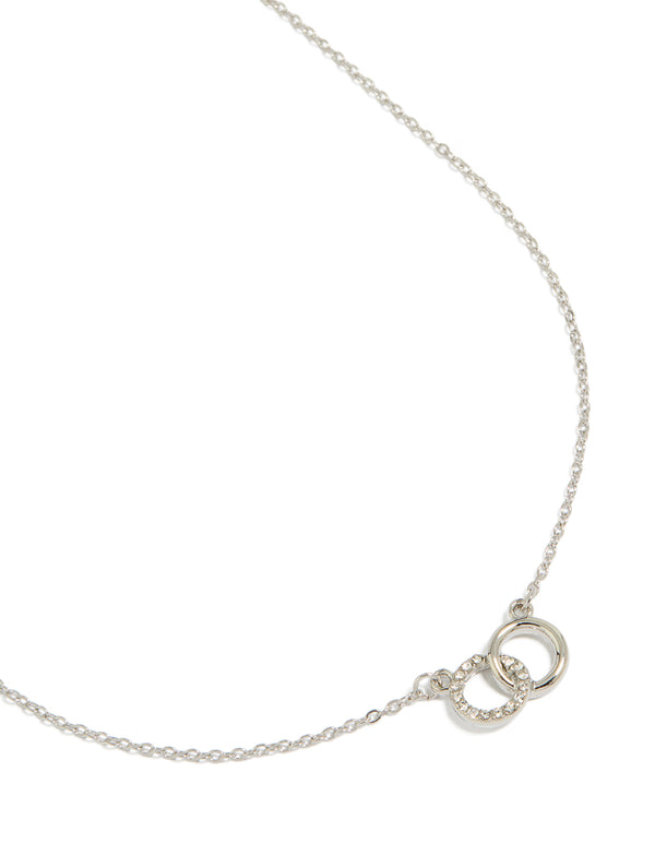 Showcasing a joined circles pendant necklace in silver close up view