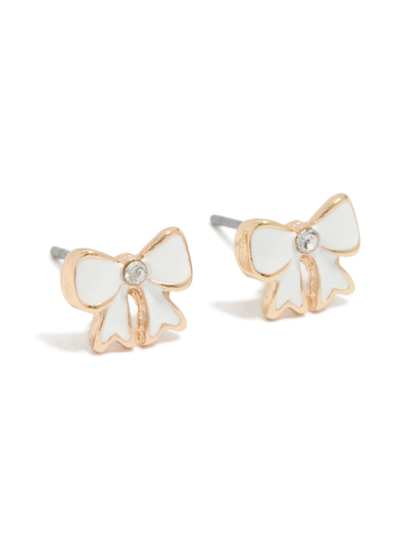 Showcasing dainty bow stud earrings with diamante centre in gold and cream enamel front view