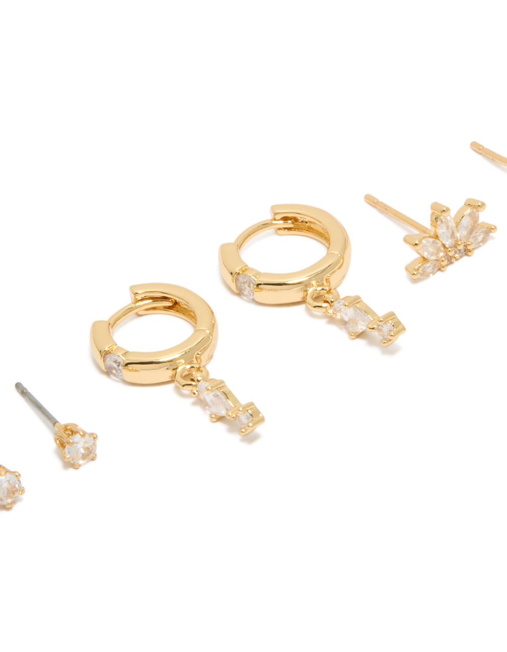 Beautifully crafted gold plated cubic zirconia studs and marquise fan earrings in a 3-pack with huggie closure close up view