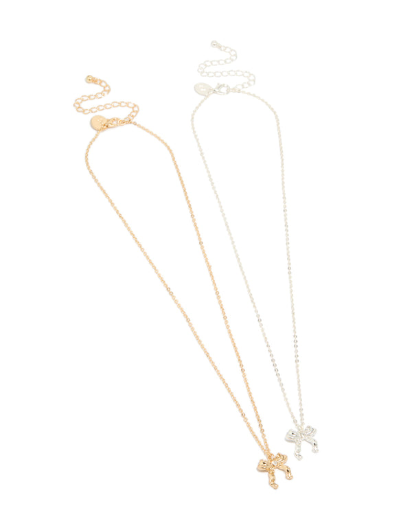 Featuring a bow pendant necklace 2-pack in gold and silver front view