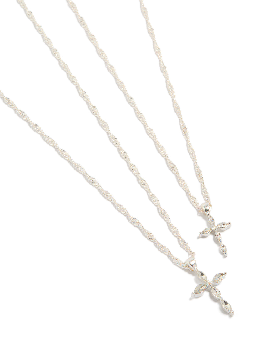 Showcasing silver diamante cross twisted chain necklaces in a 2-pack with statement styling close up view