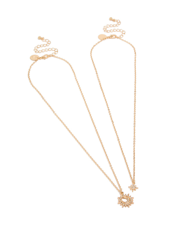 Showcasing gold diamante celestial necklaces in a 2-pack with pendant, star, sun details in statement style front view