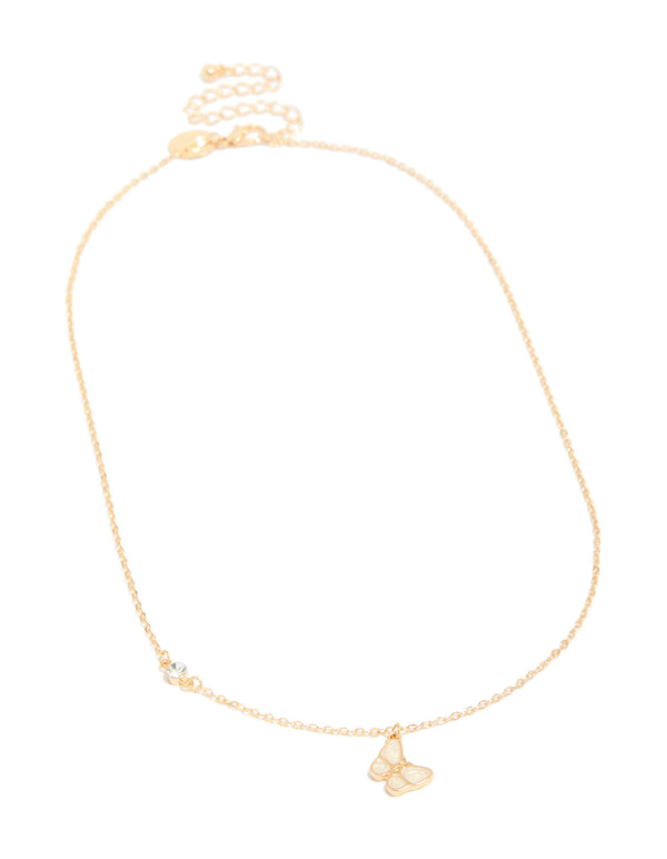 Showcasing a diamante and butterfly pendant necklace in gold front view