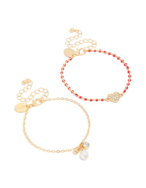 Showcasing gold red beaded diamante heart and pearl bracelets in a 2-pack with charm details front view