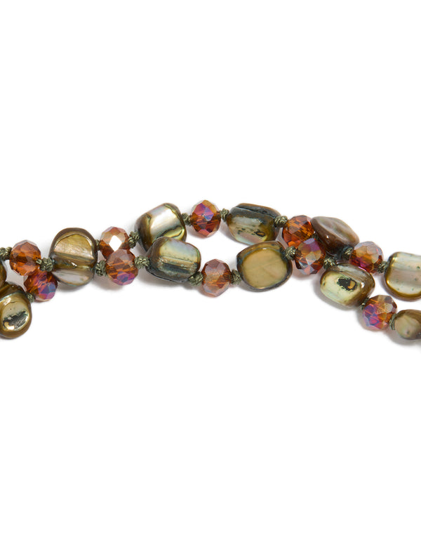 Featuring a green irregular beaded double layered long necklace with olive, darkolivegreen, brown and coral tones close up view