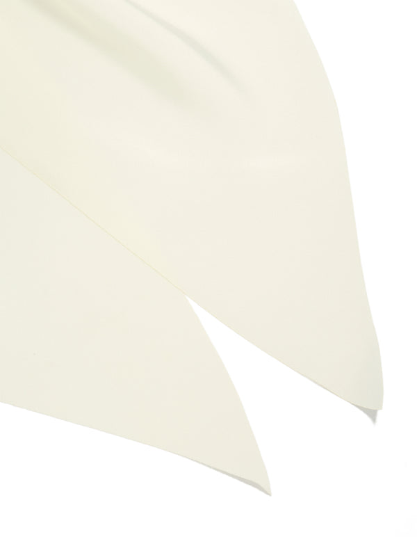 Designed with solid ivory fabric, this simple cream long scarf scrunchie detail view