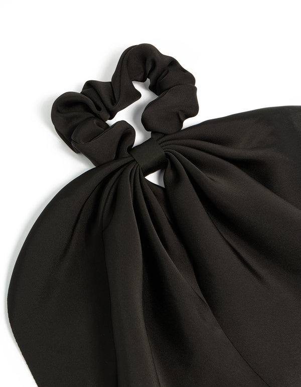 Featuring a solid black plain long scarf scrunchie side view