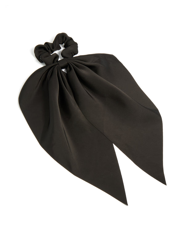 Showcasing a solid black plain long scarf scrunchie front view