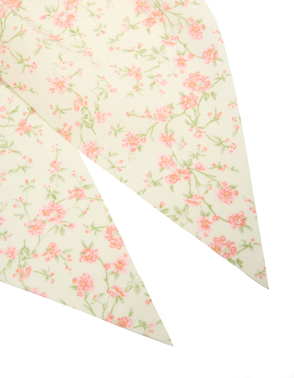 Designed with pretty pink flower printed scarf scrunchie featuring leaf and floral pattern in cornsilk, light pink, and pale green detail view
