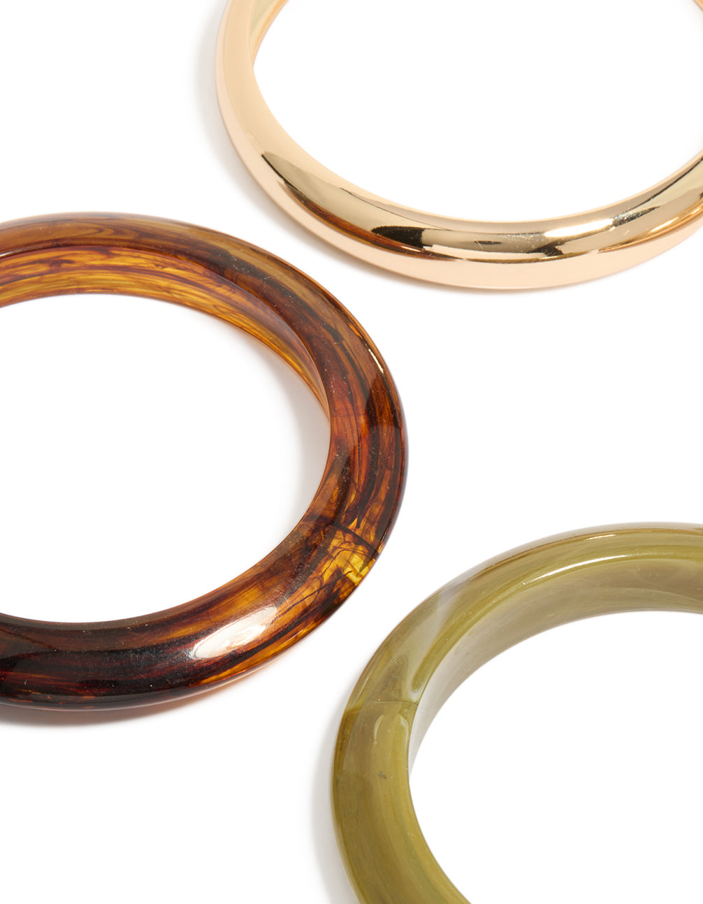 Featuring gold and green acrylic bangles in a 4-pack close up view
