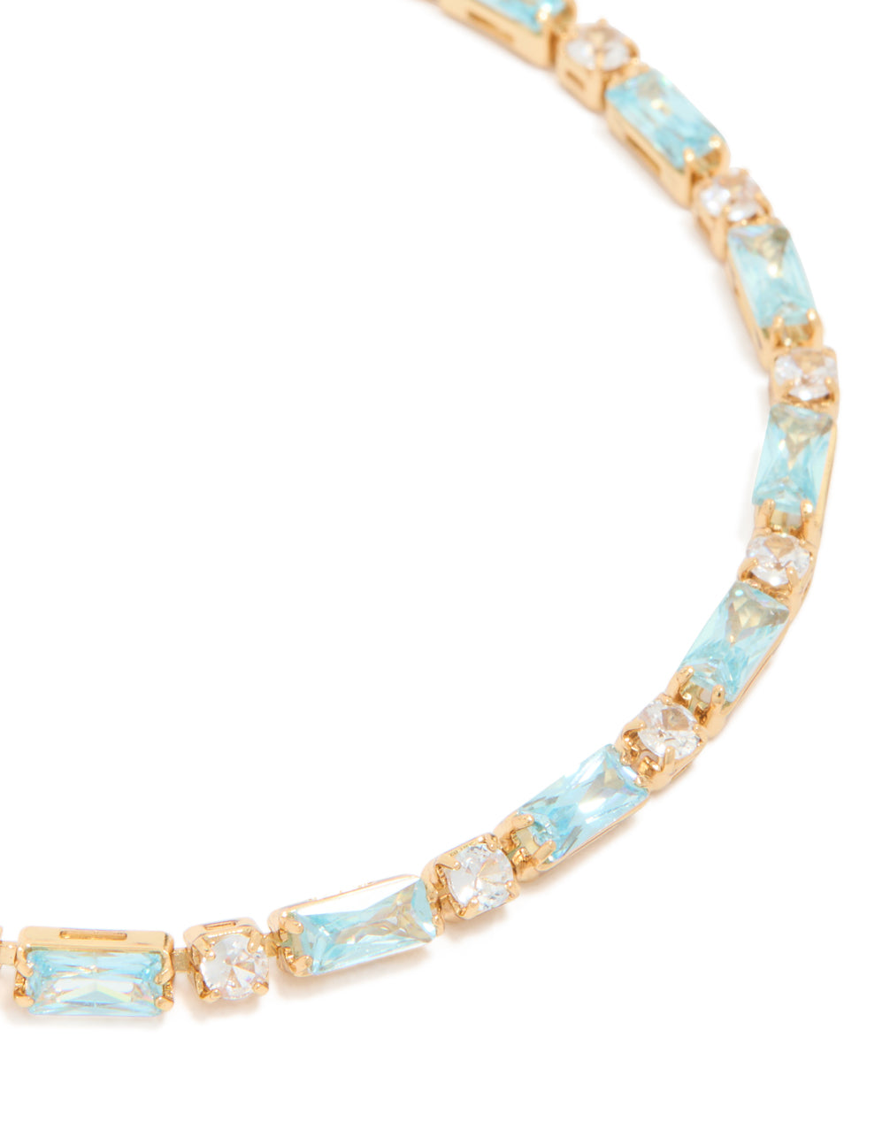 Featuring gold plated clear and blue baguette cut cubic zirconia toggle bracelet close up view