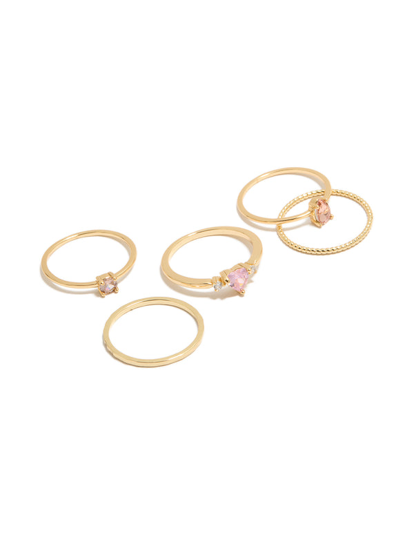Showcasing a gold plated pink heart cubic zirconia and molten rings 5-pack with crystal accents front view