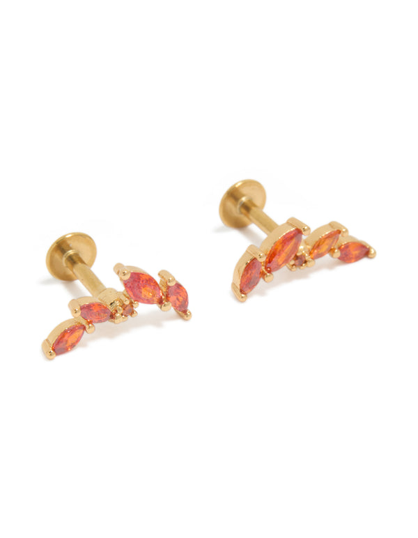 Crafted from crawler statement earrings with red cubic zirconia stones in surgical steel and flat back stud closure front view