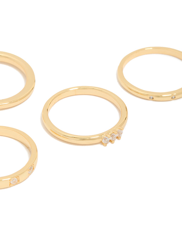 Featuring a 4-pack of gold plated rings with cubic zirconia inlay close up view