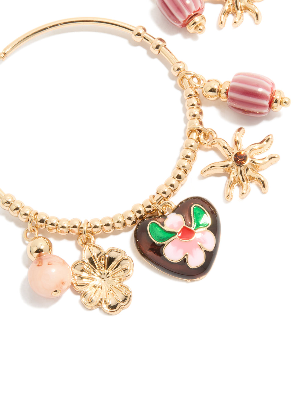 Designed with gold brown heart and sun charm hoop earrings featuring beads, celestial elements, floral design, and striped pattern close up view