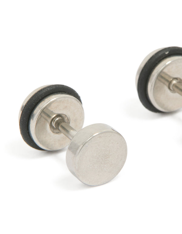 Displaying mens waterproof stainless steel round flat back stud earrings in silver and black close up view
